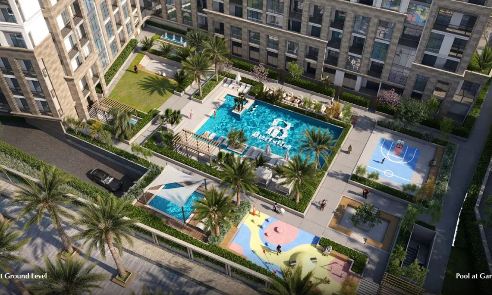 Garden-level pool and landscaped gardens at Bab Al Qasr Residence 31
