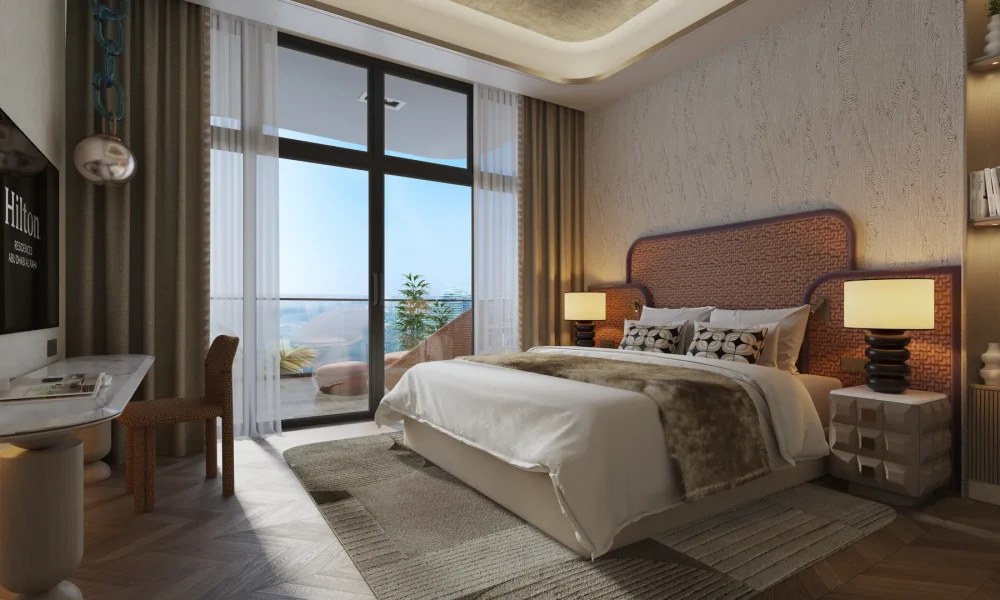 Hilton Residences Al Raha master bedroom with sea view